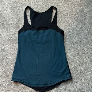 Lululemon Run: First Base Tank
Alberta Lake / Black Fits Like 6